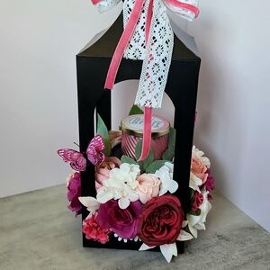 Charming Black Lantern with Floral Accents